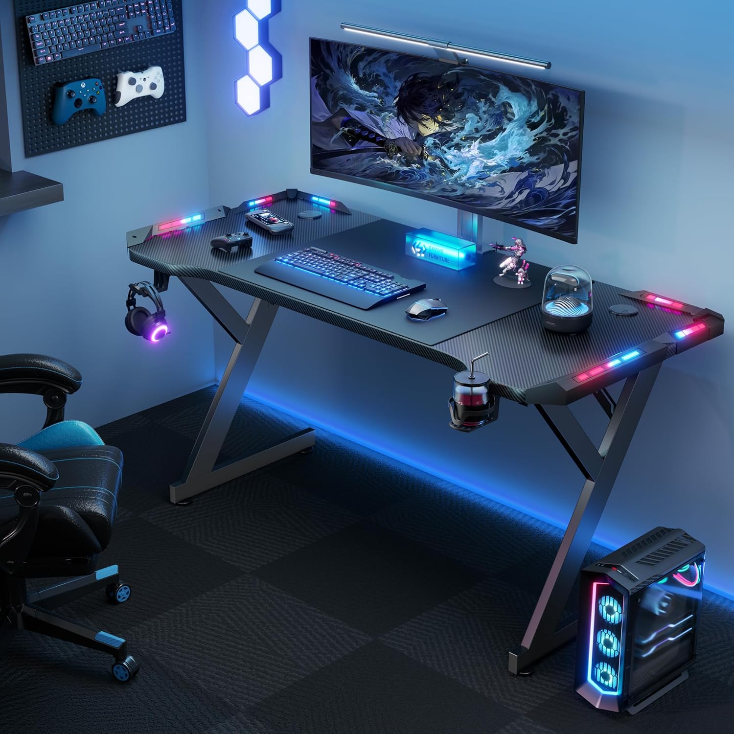 Black gaming desk with neon lights and accessories in a blue room