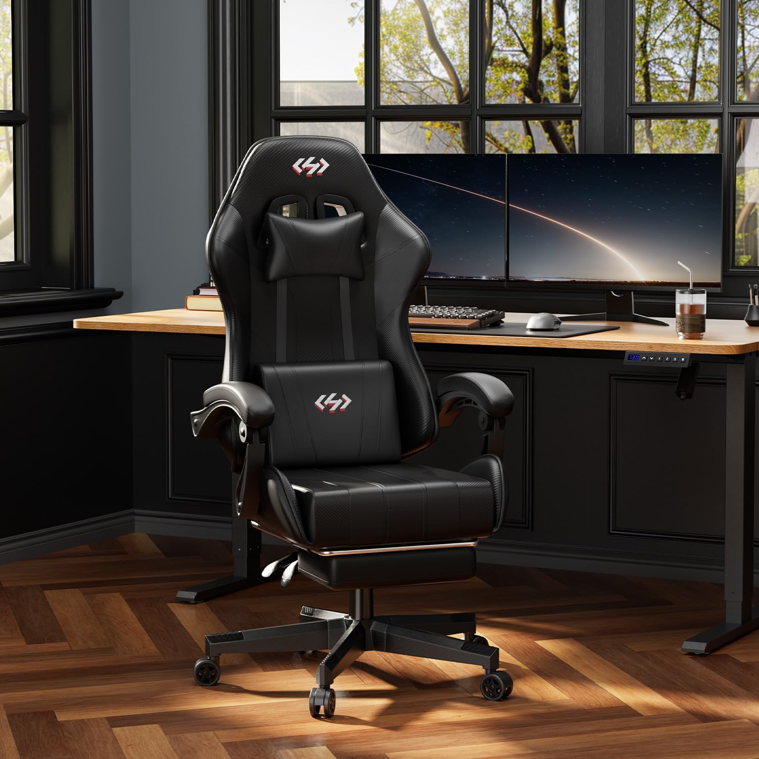 Black gaming chair in modern setup near dual-monitor desk in cozy home office environment